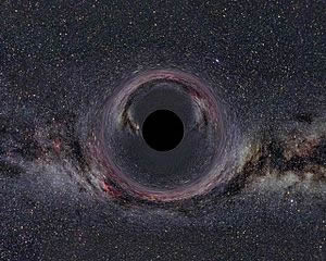 Fig. 1 - da Wikipedia: Immagine pittorica di un buco nero, se posto davanti ad uno sfondo ricco di stelle. Da notare la luce distorta dalla gravita' e l'orizzonte degli eventi. Il buco e' pensato con una massa pari a dieci volte quella del Sole, e visto da 600 km di distanza. In questa posizione sarebbe necessaria un'accelerazione pari a 4 x10^8 g per mantenere il distacco costantemente.