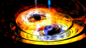 Fig. 2 - Immagine artistica che rappresenta due buchi neri che si stanno fondendo. Crediti: NASA.