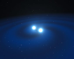 Fig. 1 - Rappresentazione artistica della fusione di stelle di neutroni. Crediti: Eso/L. Calçada/M. Kornmesser