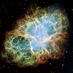 Fig. 4 - La Nebulosa Granchio. Nel centro esatto della nebulosa si trova una pulsar: una stella di neutroni che ruota alla velocità di 30 giri al secondo. Crediti Wikipedia