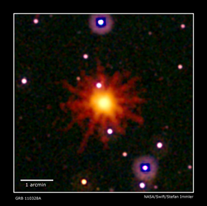 Fig. 3 - Immagine composita della sorgente misteriosa. L’immagine in raggi X (giallo e rosso) e` combinata con l’immagine nella luce visibile (bianco e viola).