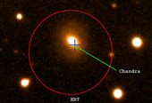 Immagine del GRB corto 050724 localizzato dal satellite Swift (cerchio rosso) e dal satellite Chandra (cerchio verde).